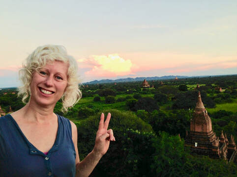 Fiona Goodwin Certified Mindfulness Teacher atop a Buddhist Temple in Myanmar cultivating mindfulness to ease anxiety